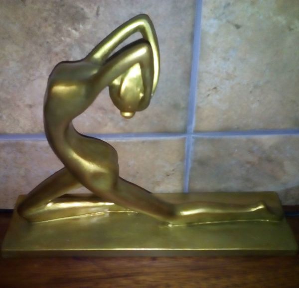 Estatueta Dourada